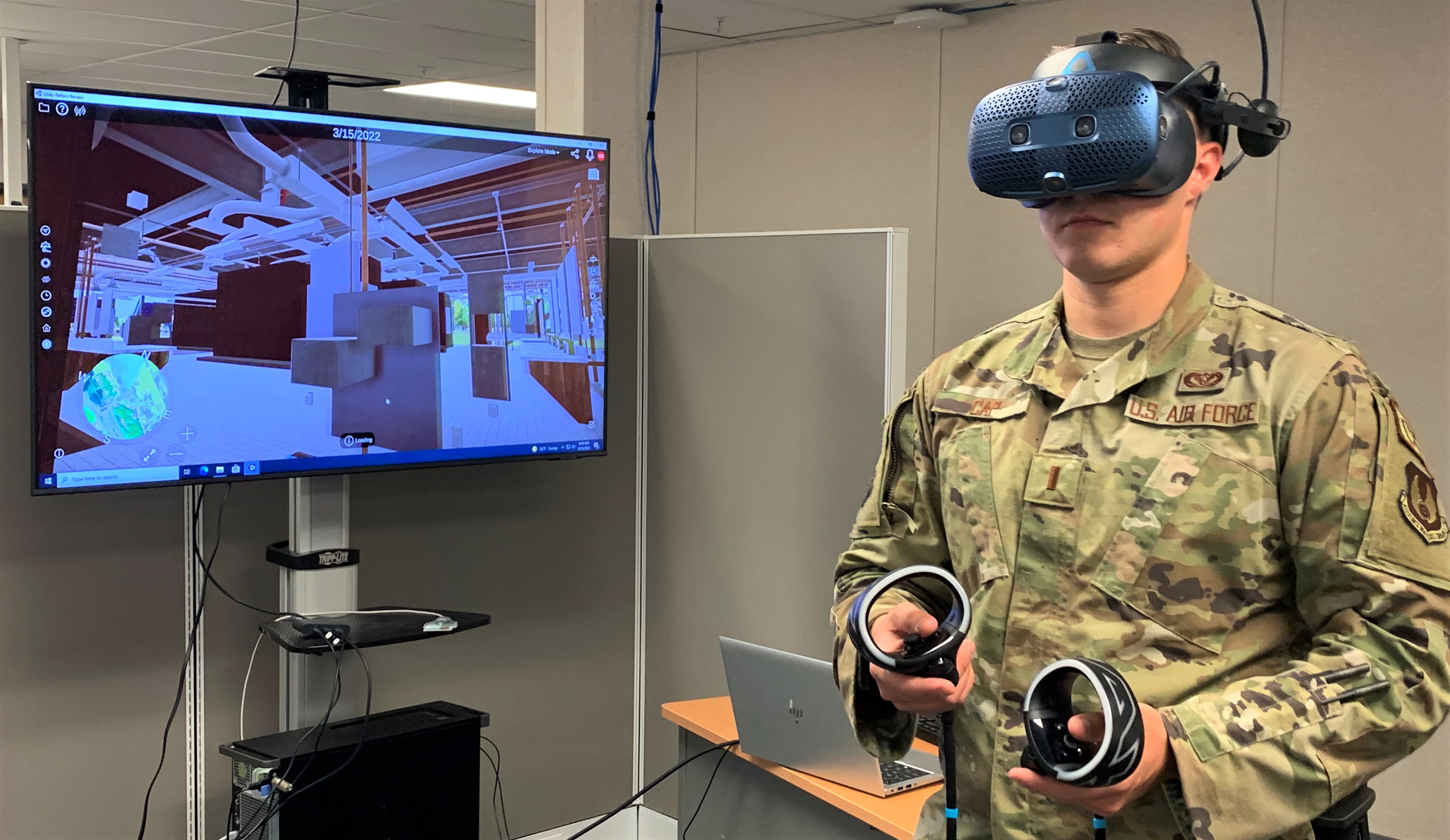 Airmen using VR equipment